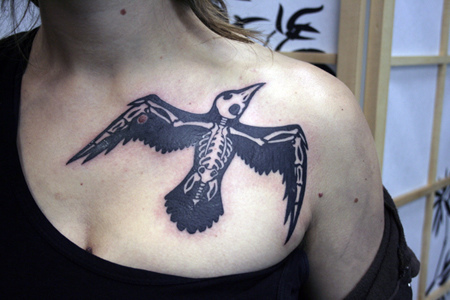 Crow skeleton tattoo Source flickrcom